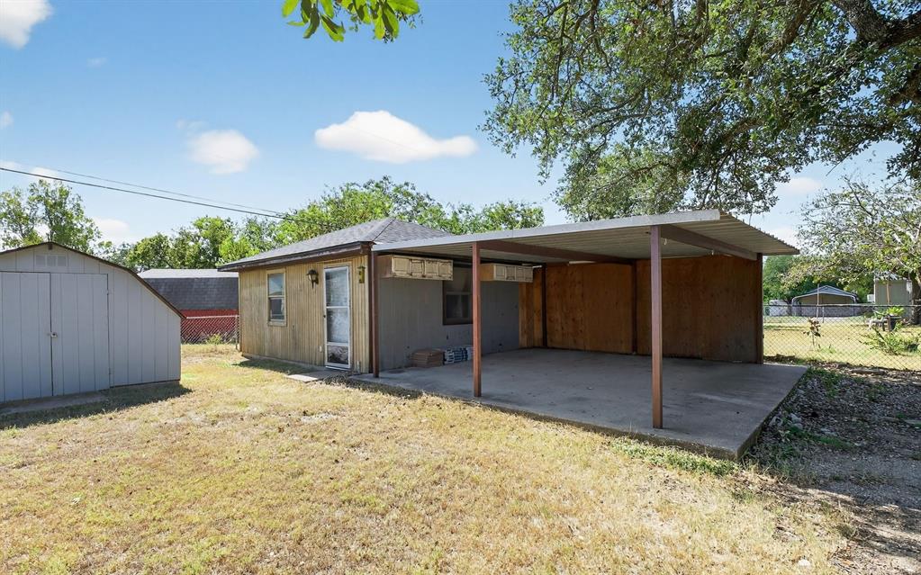 604 Fegan Street Weatherford, TX 76086 - Photo 31 of 36 a view of a house with a yard