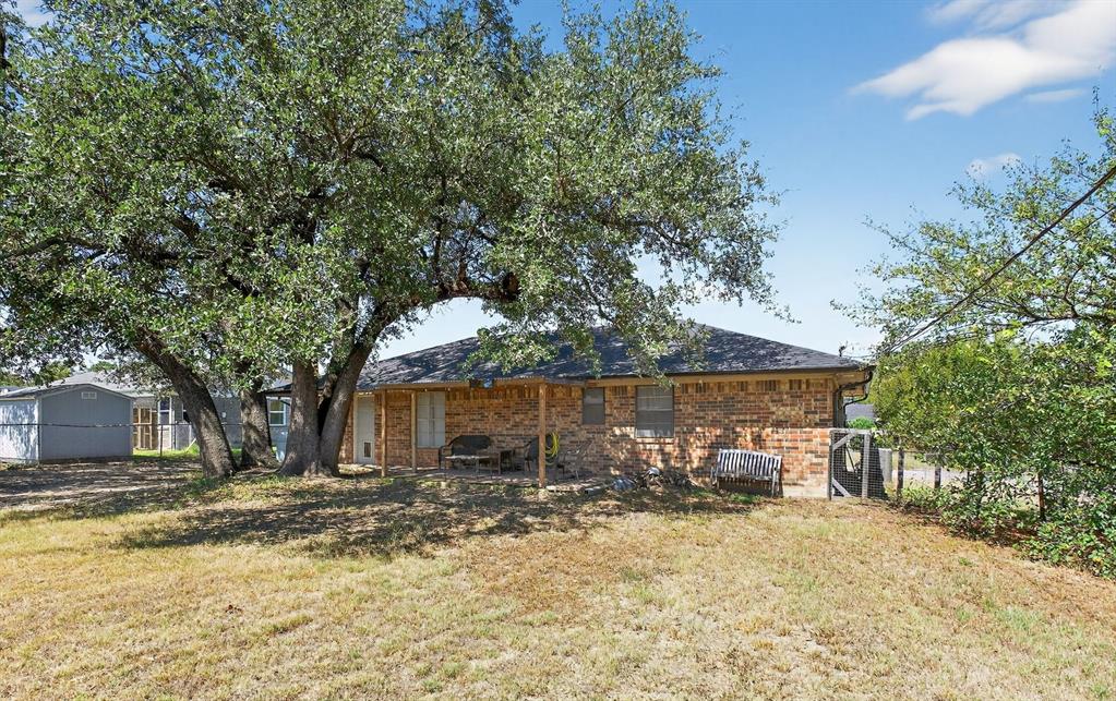 604 Fegan Street Weatherford, TX 76086 - Photo 36 of 36 a view of a house with a yard