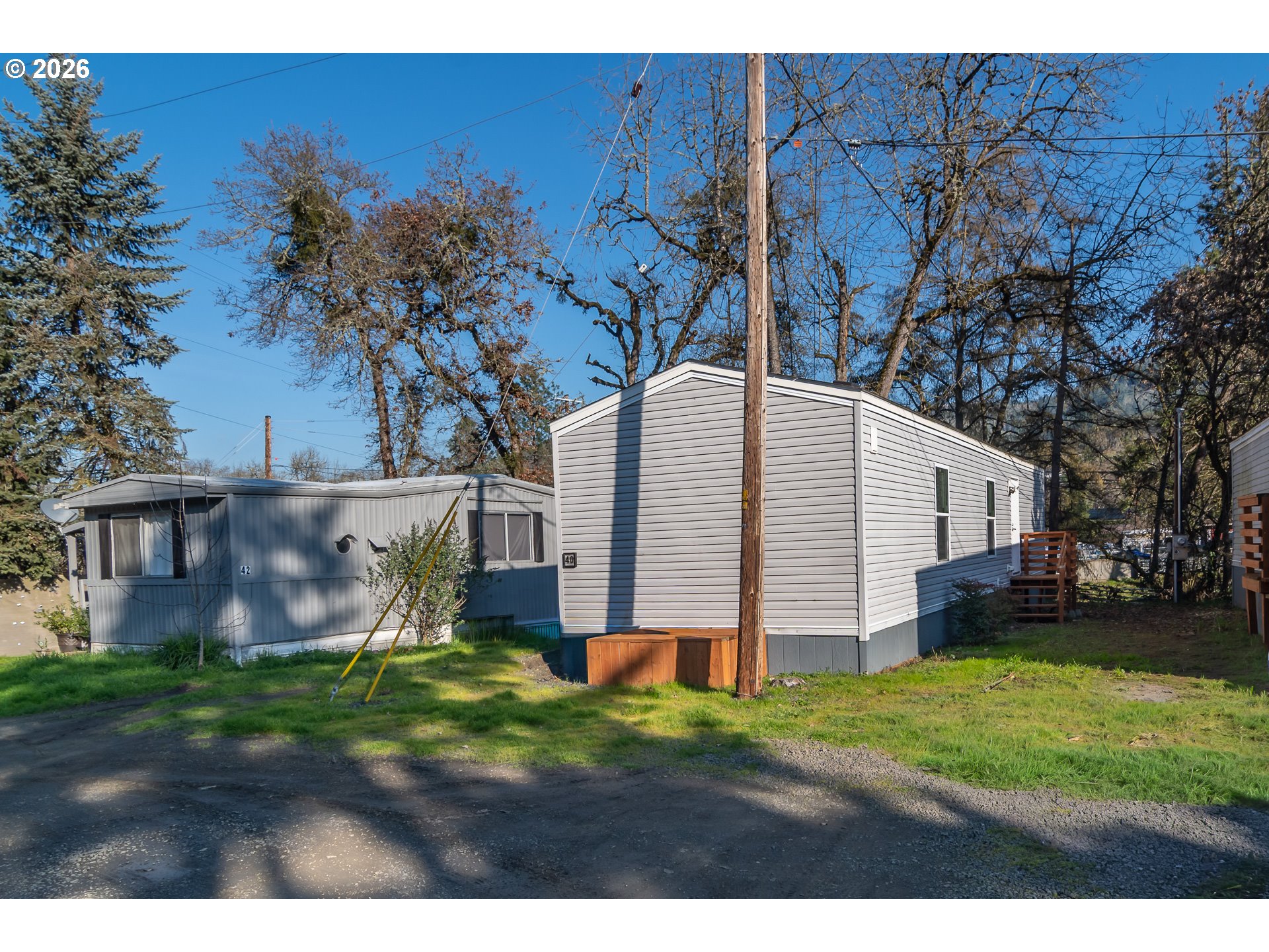 5000 Northeast Stephens Street, Unit 40 Roseburg, OR 97470 - Photo 2 of 27 a view of backyard of house
