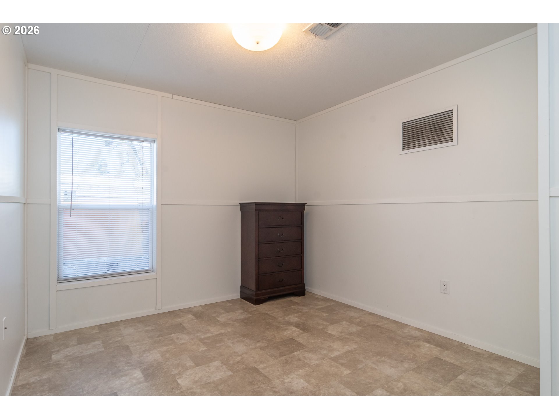 5000 Northeast Stephens Street, Unit 40 Roseburg, OR 97470 - Photo 24 of 27 a view of an empty room with a window