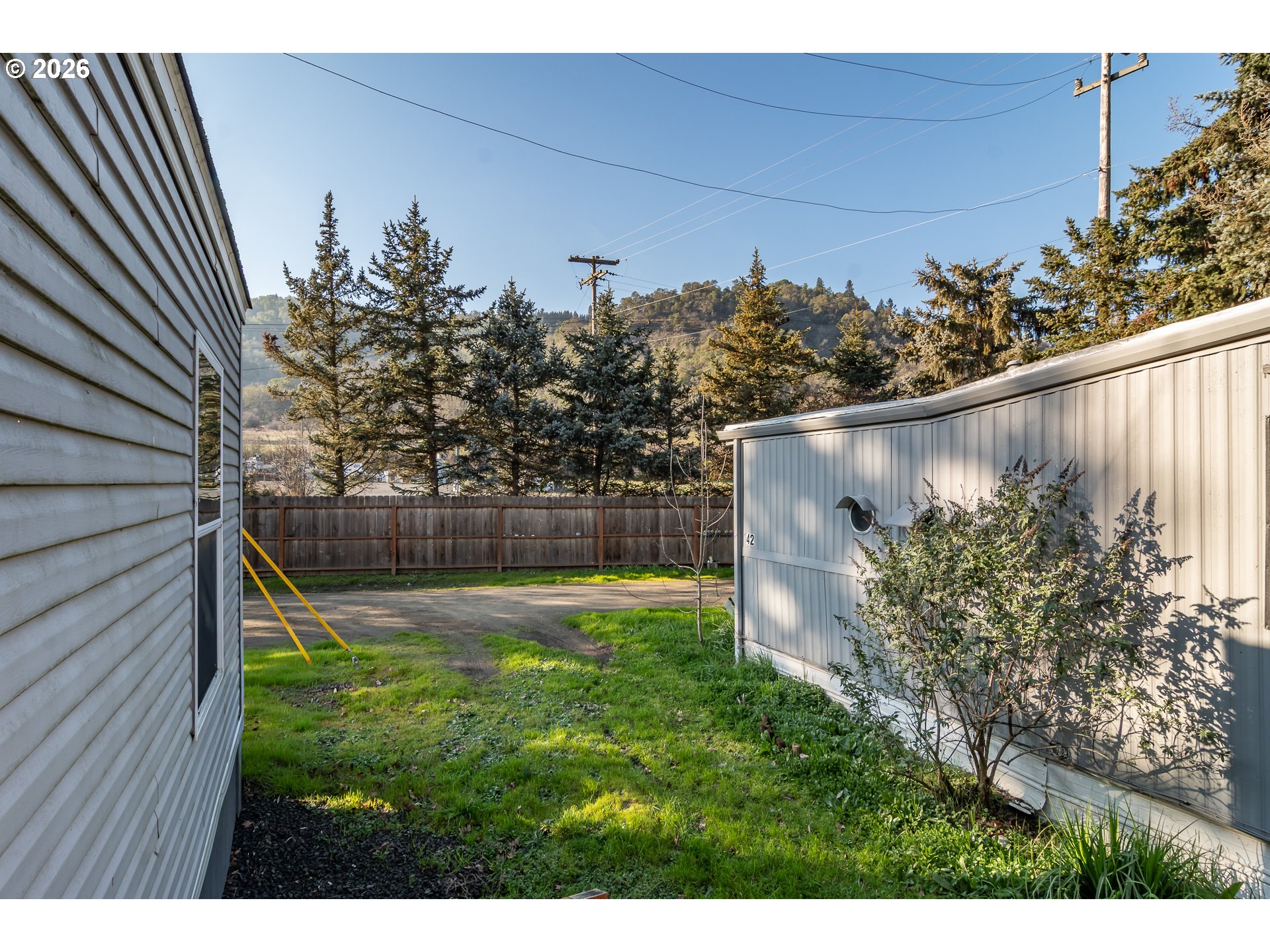 5000 Northeast Stephens Street, Unit 40 Roseburg, OR 97470 - Photo 26 of 27 a view of a backyard