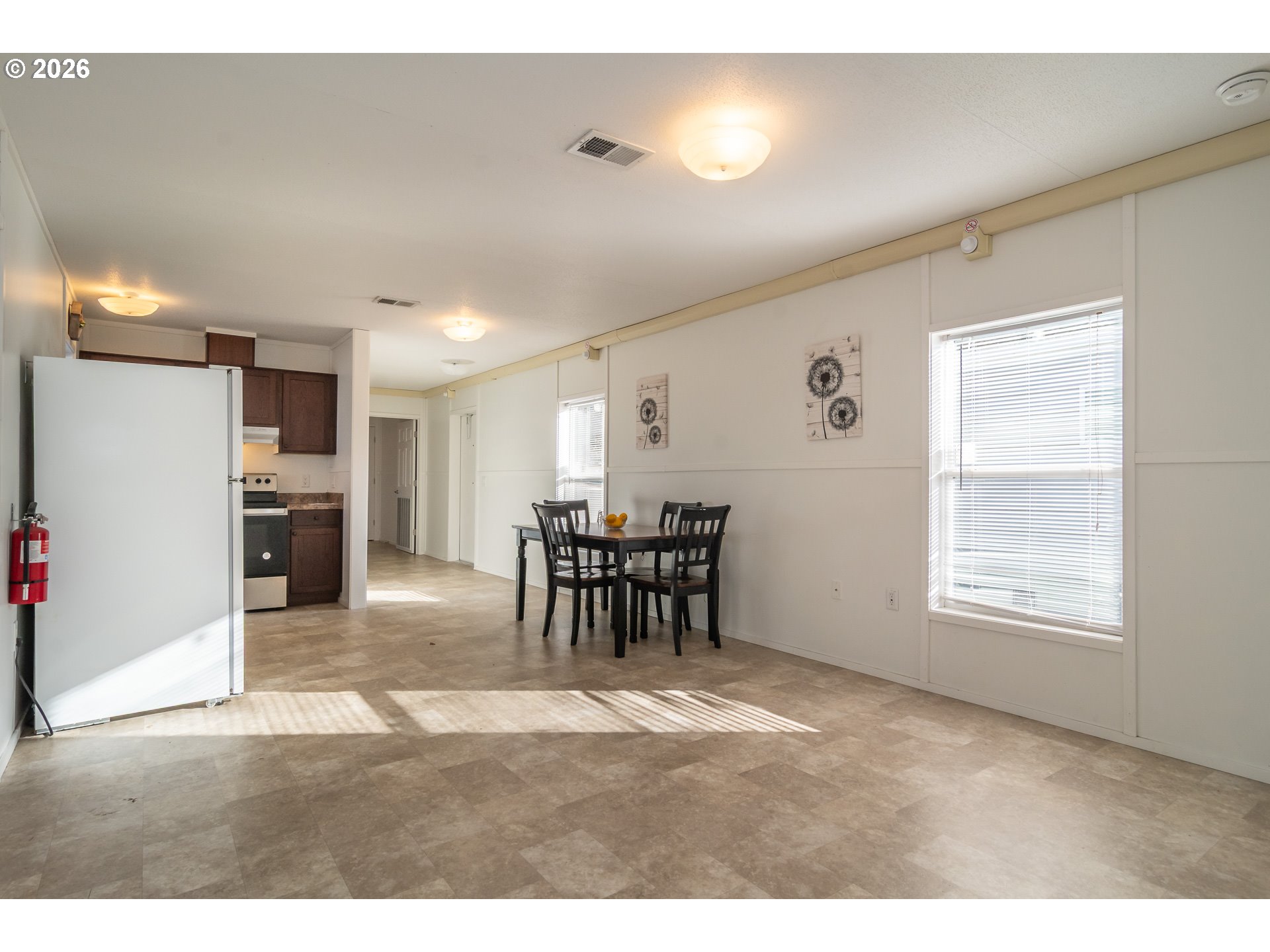 5000 Northeast Stephens Street, Unit 40 Roseburg, OR 97470 - Photo 8 of 27 a view of dining room with furniture and a kitchen