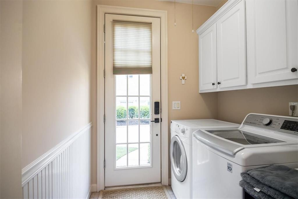 208 Grandmar Chase Canton, GA 30115 - Photo 30 of 67 a utility room with dryer and washer