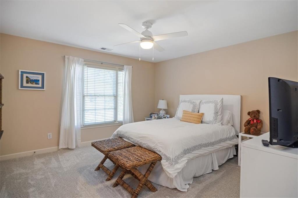 208 Grandmar Chase Canton, GA 30115 - Photo 31 of 67 a bedroom with a bed and a window