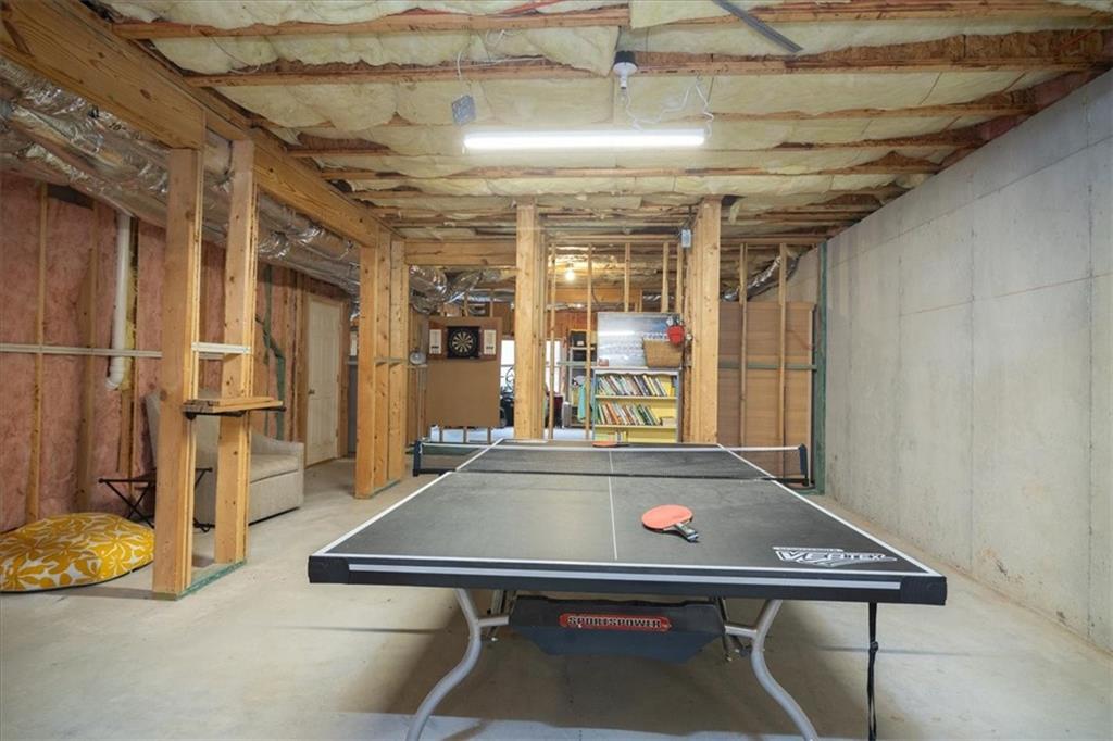 208 Grandmar Chase Canton, GA 30115 - Photo 43 of 67 a room with pool table and windows