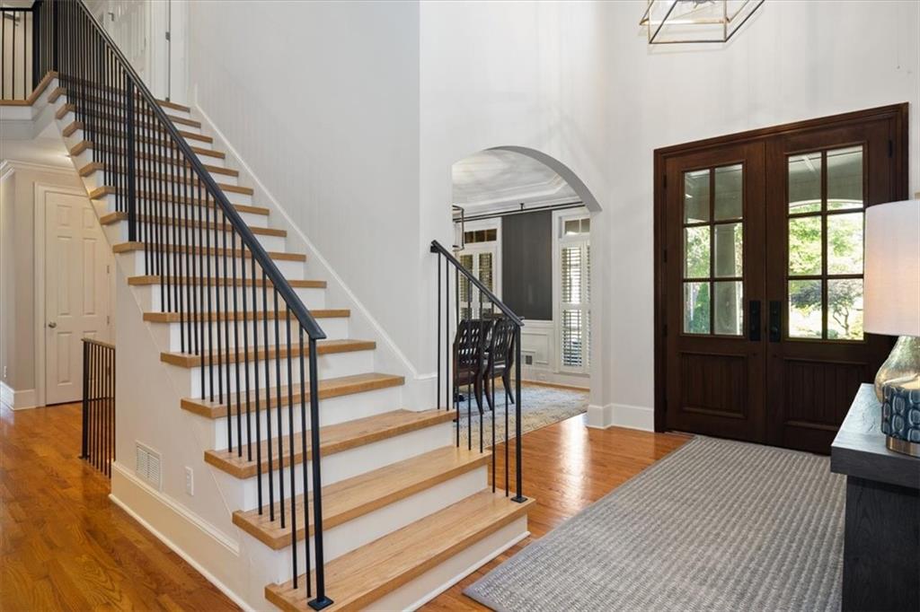 208 Grandmar Chase Canton, GA 30115 - Photo 7 of 67 a view of entryway and hall with wooden floor