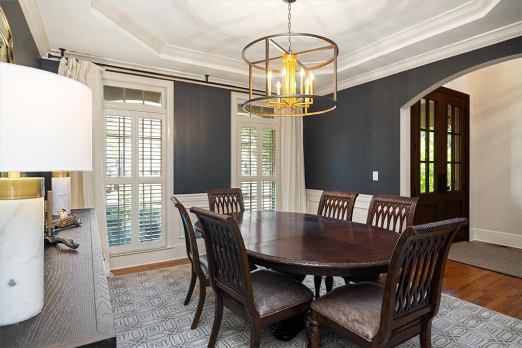208 Grandmar Chase Canton, GA 30115 - Photo 9 of 67 a view of a dining room with furniture window and wooden floor