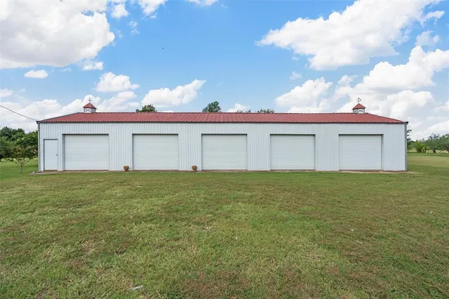 a view of a house with a garden