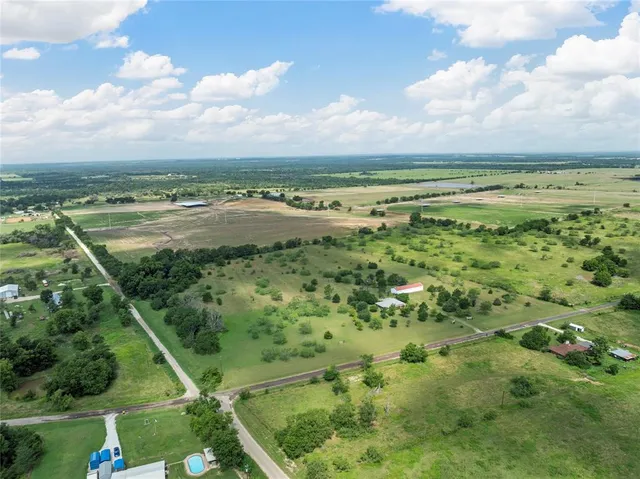 a view of a garden with an ocean