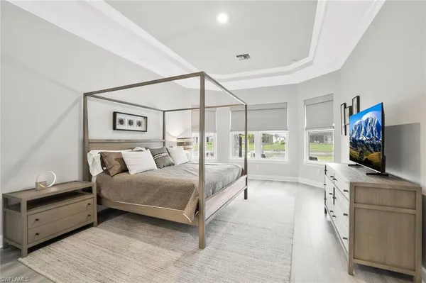 a open kitchen with stainless steel appliances granite countertop a stove center island a dining table and chairs