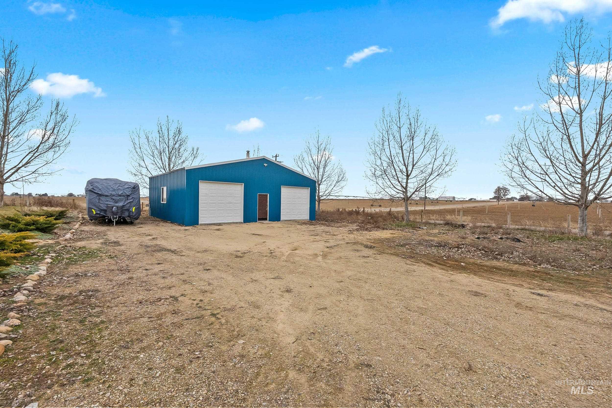 12944 Goodson Road Caldwell, ID 83607 - Photo 40 of 47 View of outdoor structure with a rural view