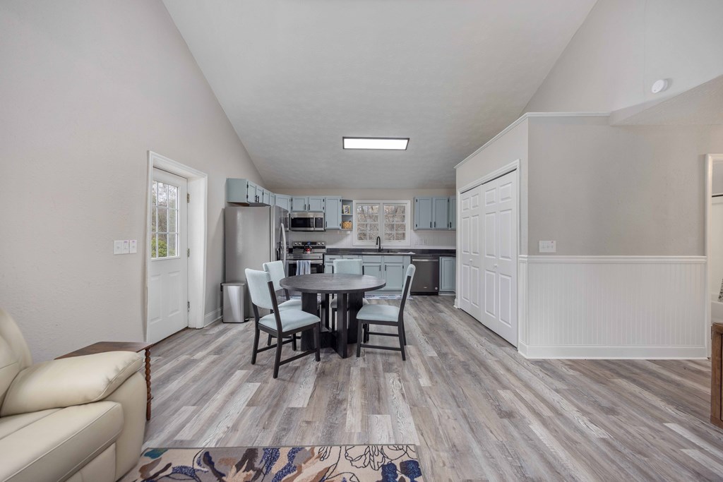 6703 Aldora Drive Columbus, GA 31907 - Photo 12 of 25 a view of a dining room with furniture and wooden floor