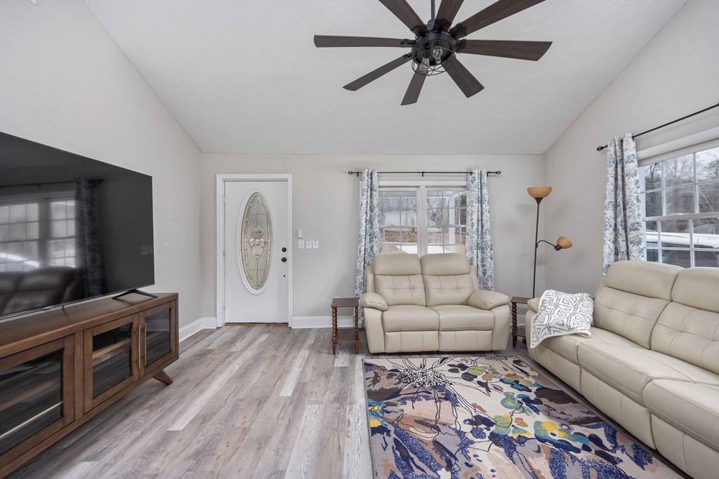 6703 Aldora Drive Columbus, GA 31907 - Photo 14 of 25 a living room with furniture and a flat screen tv