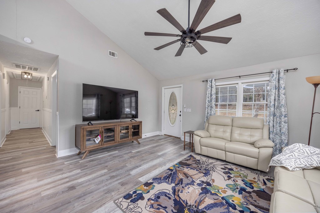 6703 Aldora Drive Columbus, GA 31907 - Photo 15 of 25 a living room with furniture and a flat screen tv