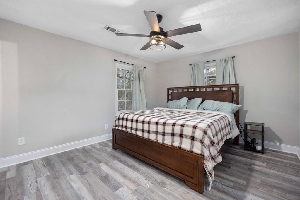 6703 Aldora Drive Columbus, GA 31907 - Photo 18 of 25 a bedroom with a bed and window