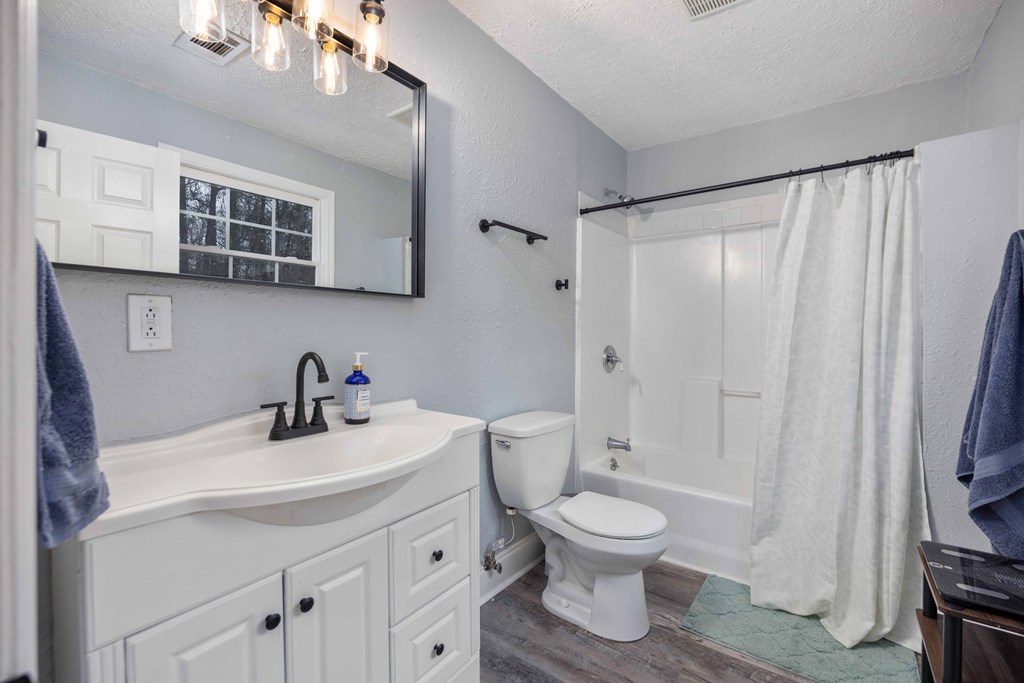 6703 Aldora Drive Columbus, GA 31907 - Photo 19 of 25 a bathroom with a sink toilet and shower
