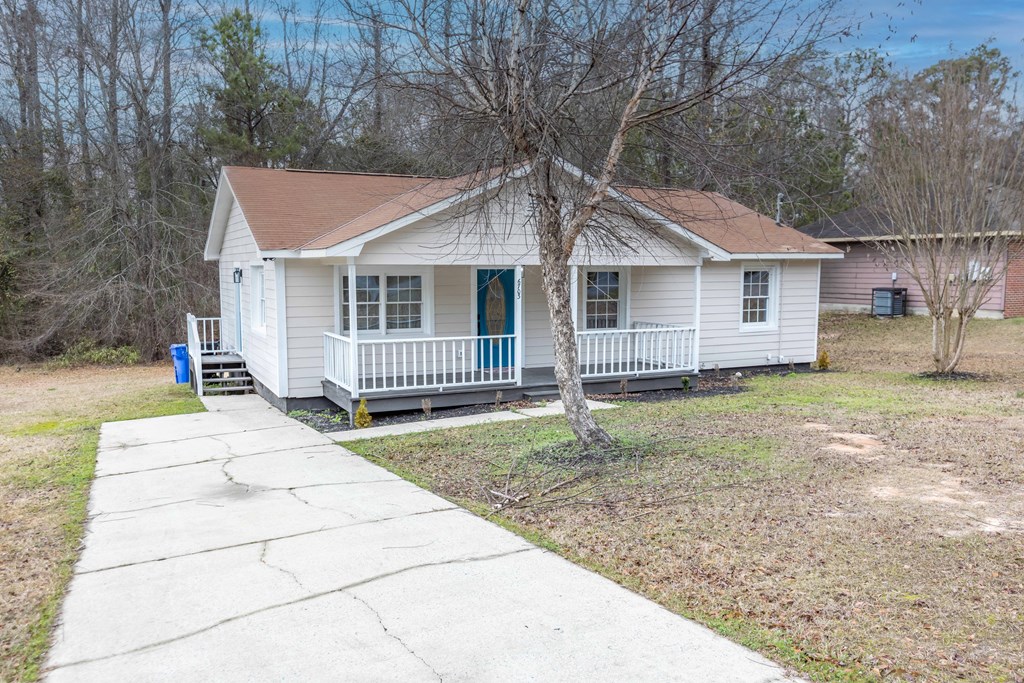 6703 Aldora Drive Columbus, GA 31907 - Photo 2 of 25 a view of a house with a yard