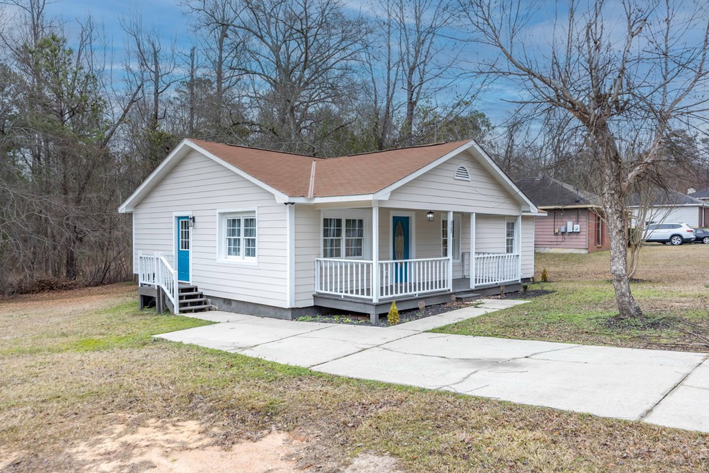 6703 Aldora Drive Columbus, GA 31907 - Photo 4 of 25 a house with trees in the background