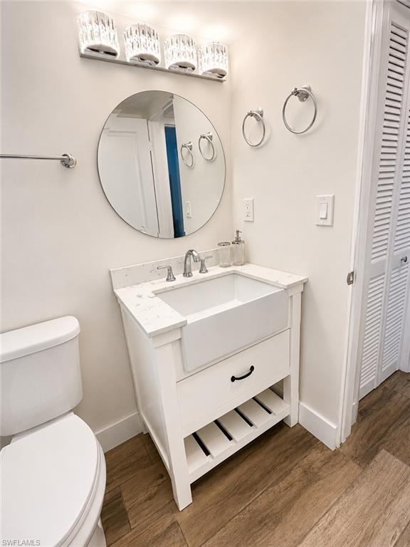 3325 Airport Road North, Unit R4 Naples, FL 34105 - Photo 15 of 18 Updated vanity, lighting, mirror and hardware