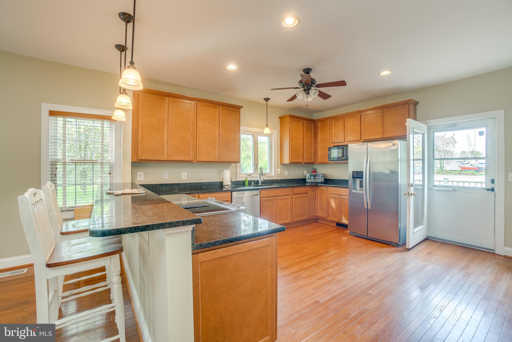 3611 Red Rose Farm Road Baltimore, MD 21220 - Photo 4 of 37 Maple cabinets and granite countertops