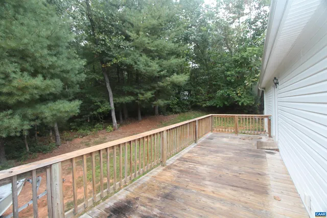 a view of balcony with two trees