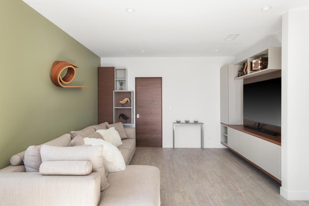 2807 Caminito Turnberry La Jolla, CA 92037 - Photo 23 of 50 a bedroom with a bed and a couch