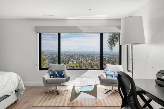 an aerial view of residential house with outdoor space