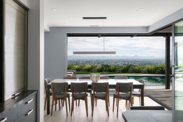 a kitchen with stainless steel appliances kitchen island a sink stove and refrigerator