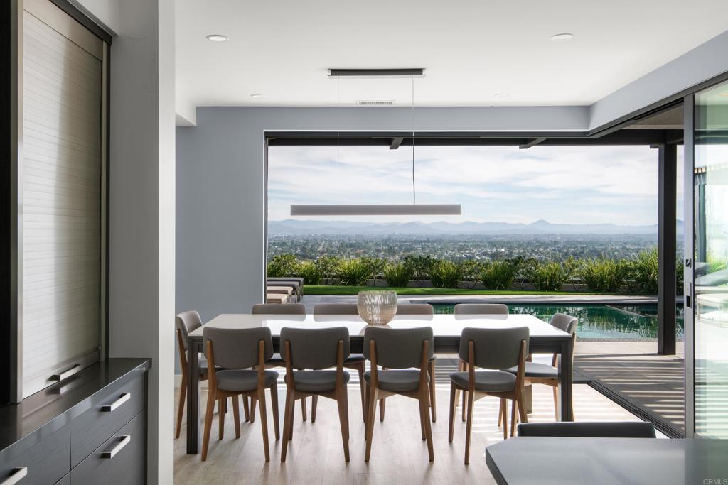 2807 Caminito Turnberry La Jolla, CA 92037 - Photo 9 of 50 a view of a dining room with furniture window and outside view