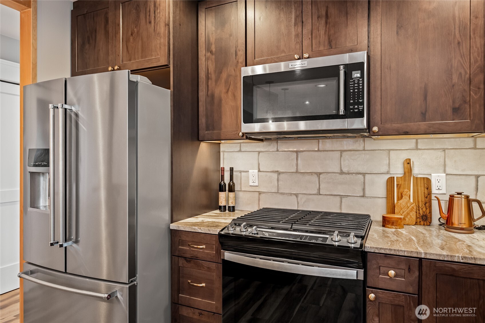 1726 63rd Street Southeast Everett, WA 98203 - Photo 12 of 37 a kitchen with a stove microwave and refrigerator