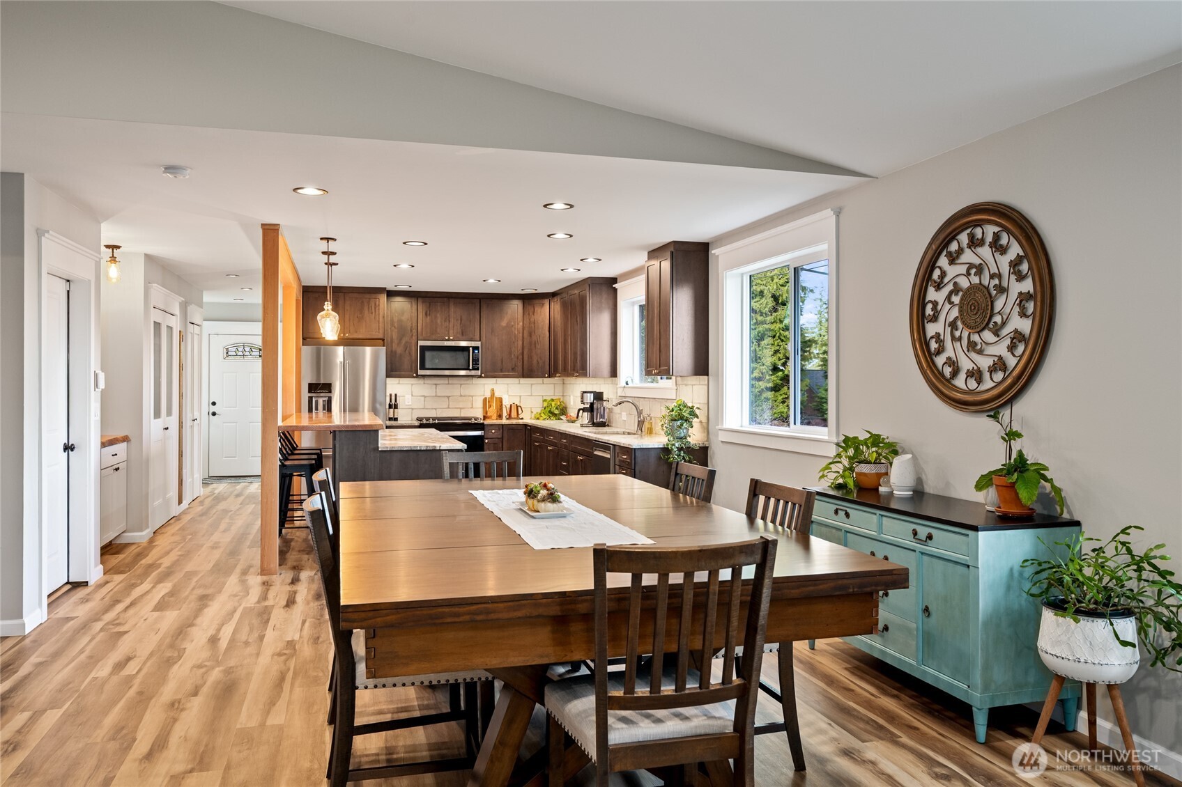 1726 63rd Street Southeast Everett, WA 98203 - Photo 14 of 37 a view of a dining room with furniture window and wooden floor