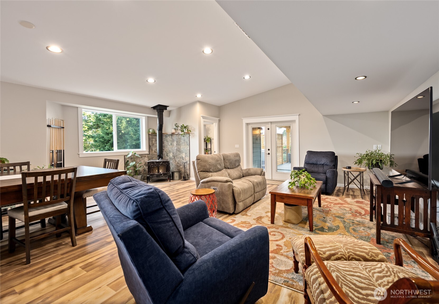 1726 63rd Street Southeast Everett, WA 98203 - Photo 16 of 37 a living room with furniture two window and a dining table