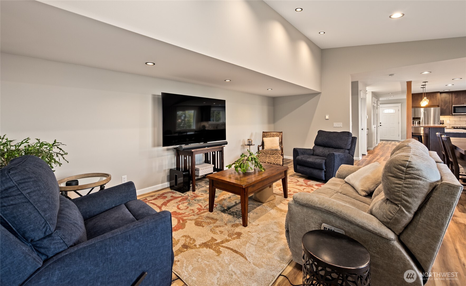 1726 63rd Street Southeast Everett, WA 98203 - Photo 17 of 37 a living room with furniture and a flat screen tv