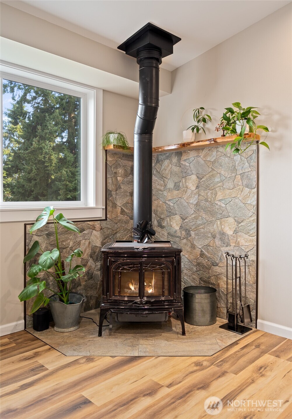 1726 63rd Street Southeast Everett, WA 98203 - Photo 18 of 37 a living room with furniture and a fireplace