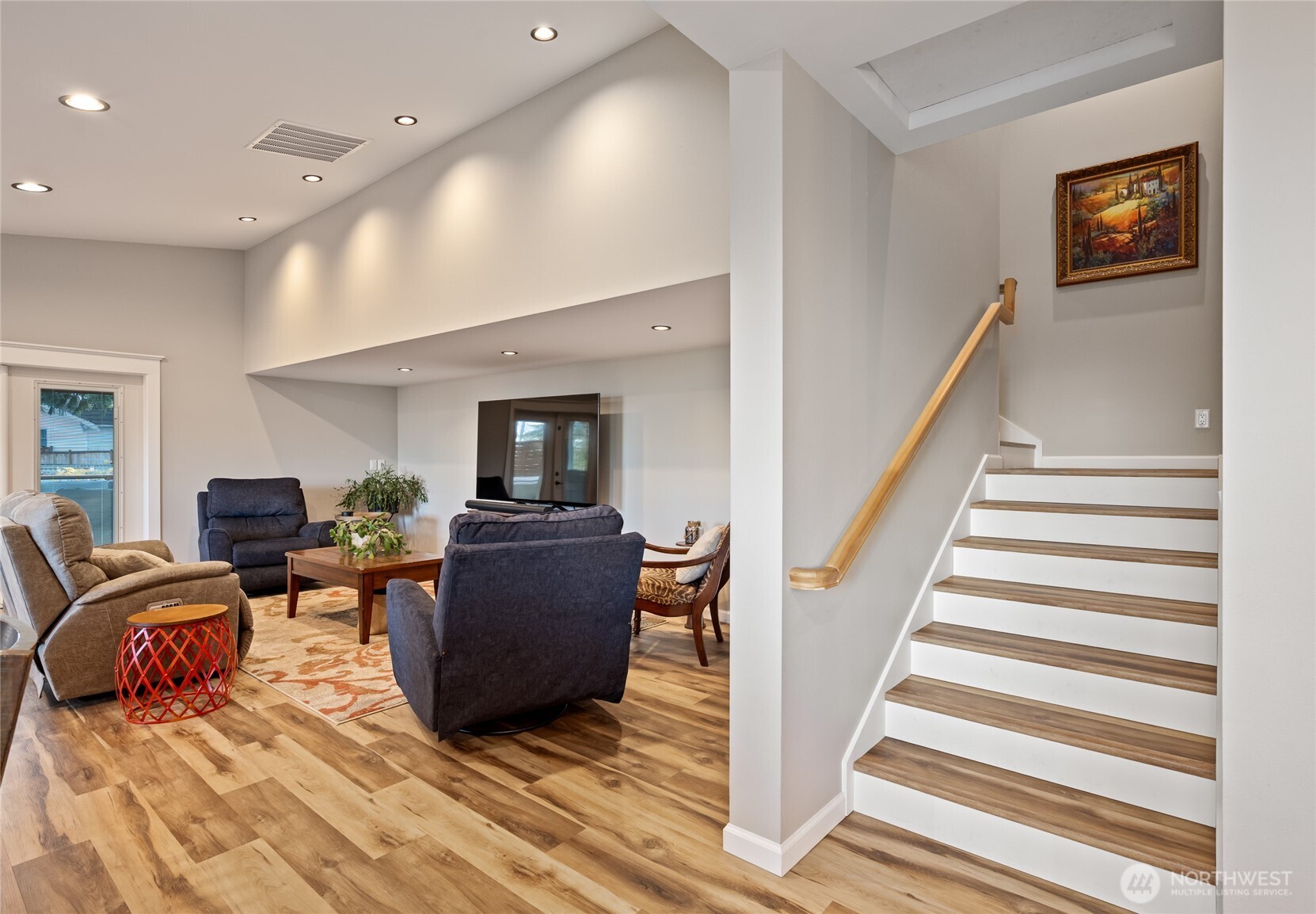 1726 63rd Street Southeast Everett, WA 98203 - Photo 23 of 37 a living room with furniture and a wooden floor