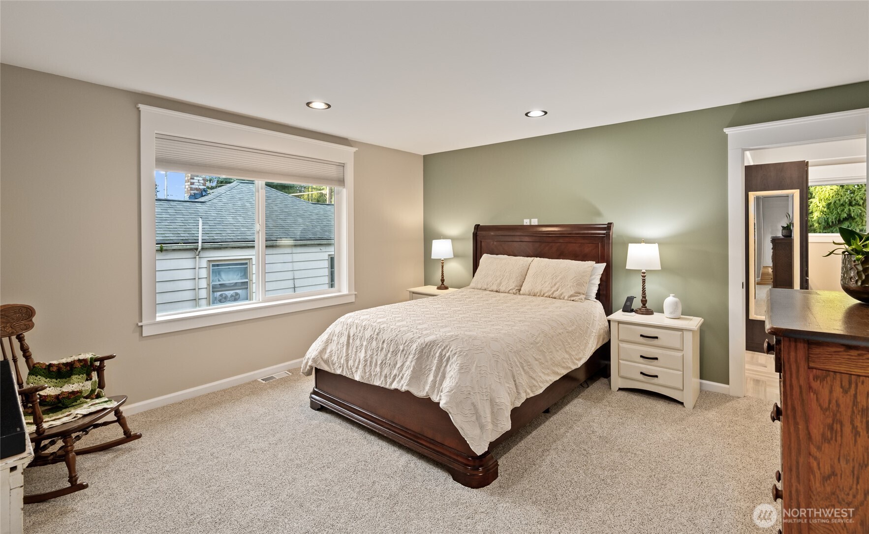 1726 63rd Street Southeast Everett, WA 98203 - Photo 24 of 37 a spacious bedroom with a bed and a window