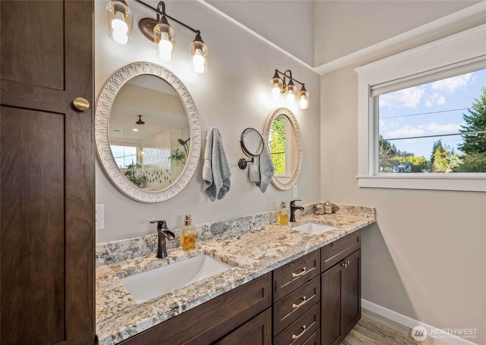 1726 63rd Street Southeast Everett, WA 98203 - Photo 25 of 37 a bathroom with a granite countertop double vanity sink and a mirror