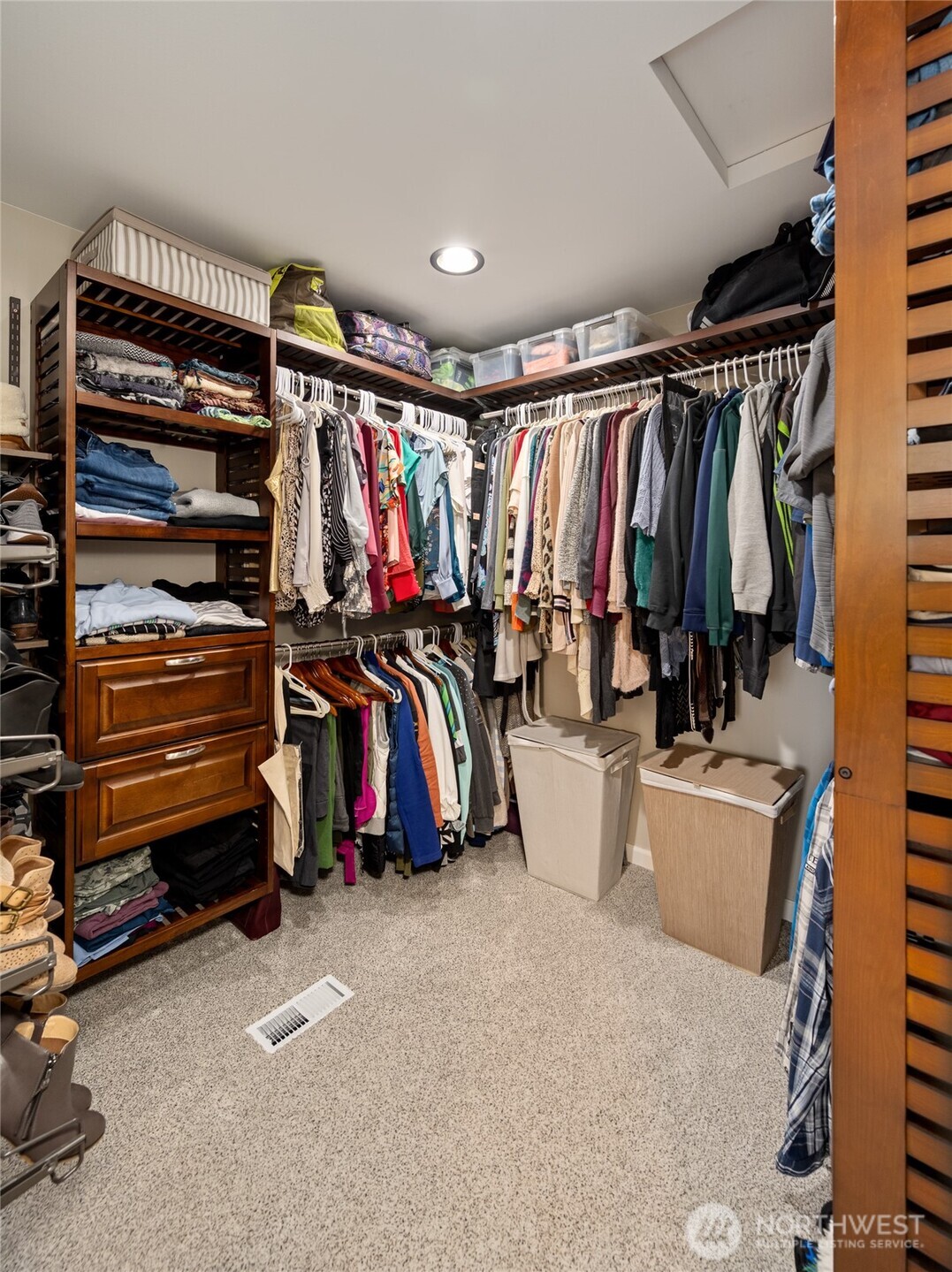 1726 63rd Street Southeast Everett, WA 98203 - Photo 28 of 37 a view of walk in closet with clothes and shoes