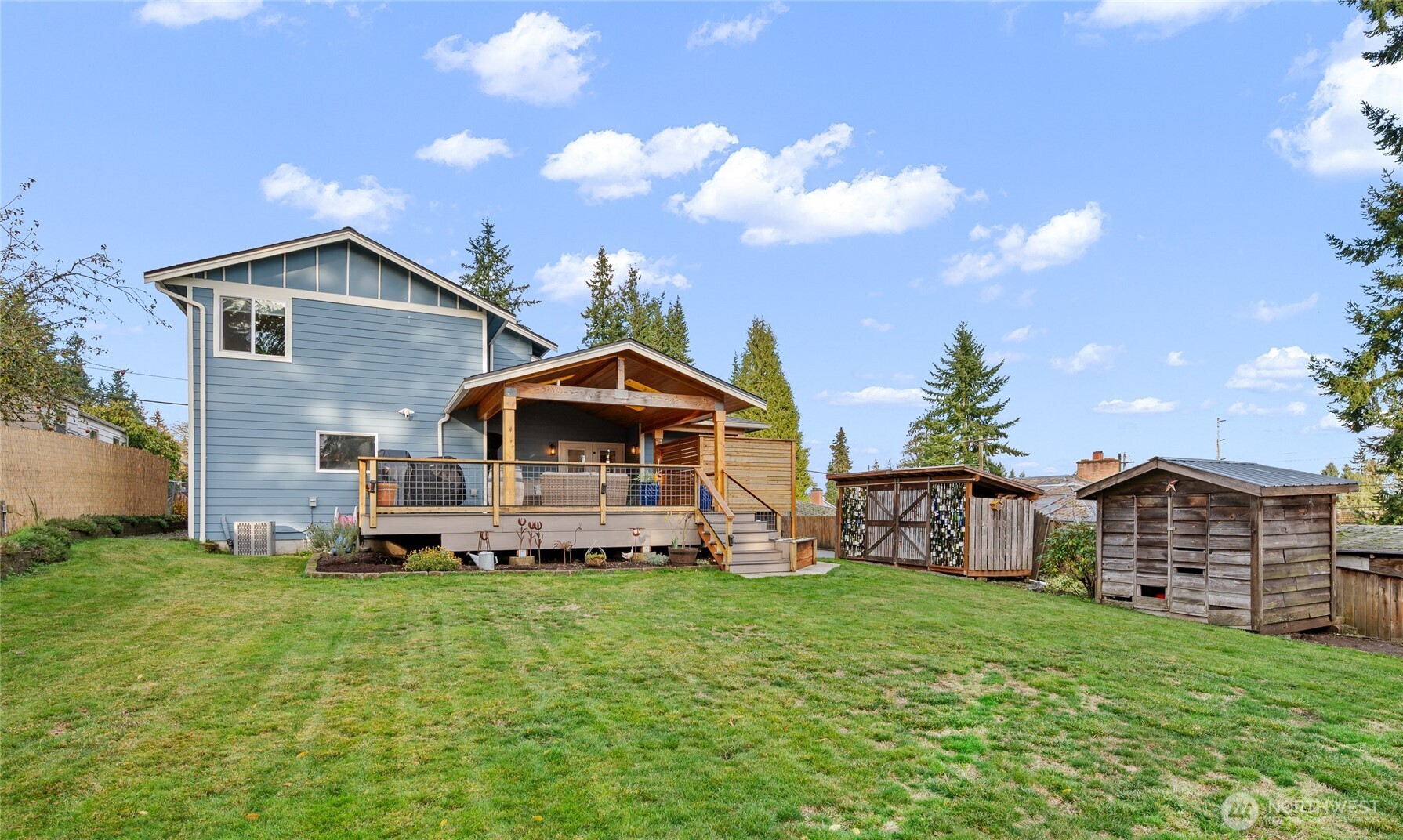 1726 63rd Street Southeast Everett, WA 98203 - Photo 34 of 37 a front view of a house with a yard and entertaining space