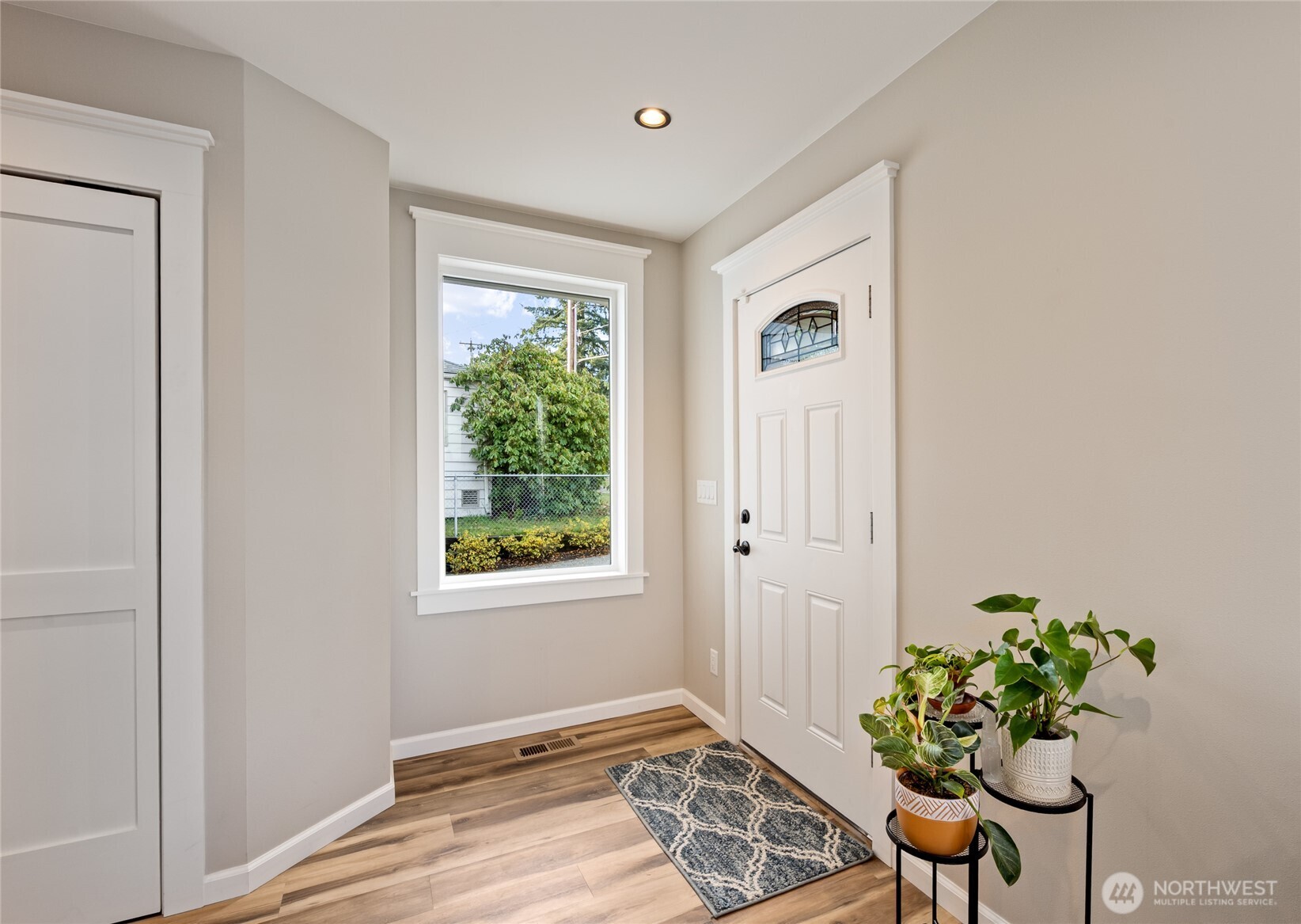 1726 63rd Street Southeast Everett, WA 98203 - Photo 6 of 37 a view of a livingroom with a potted plant