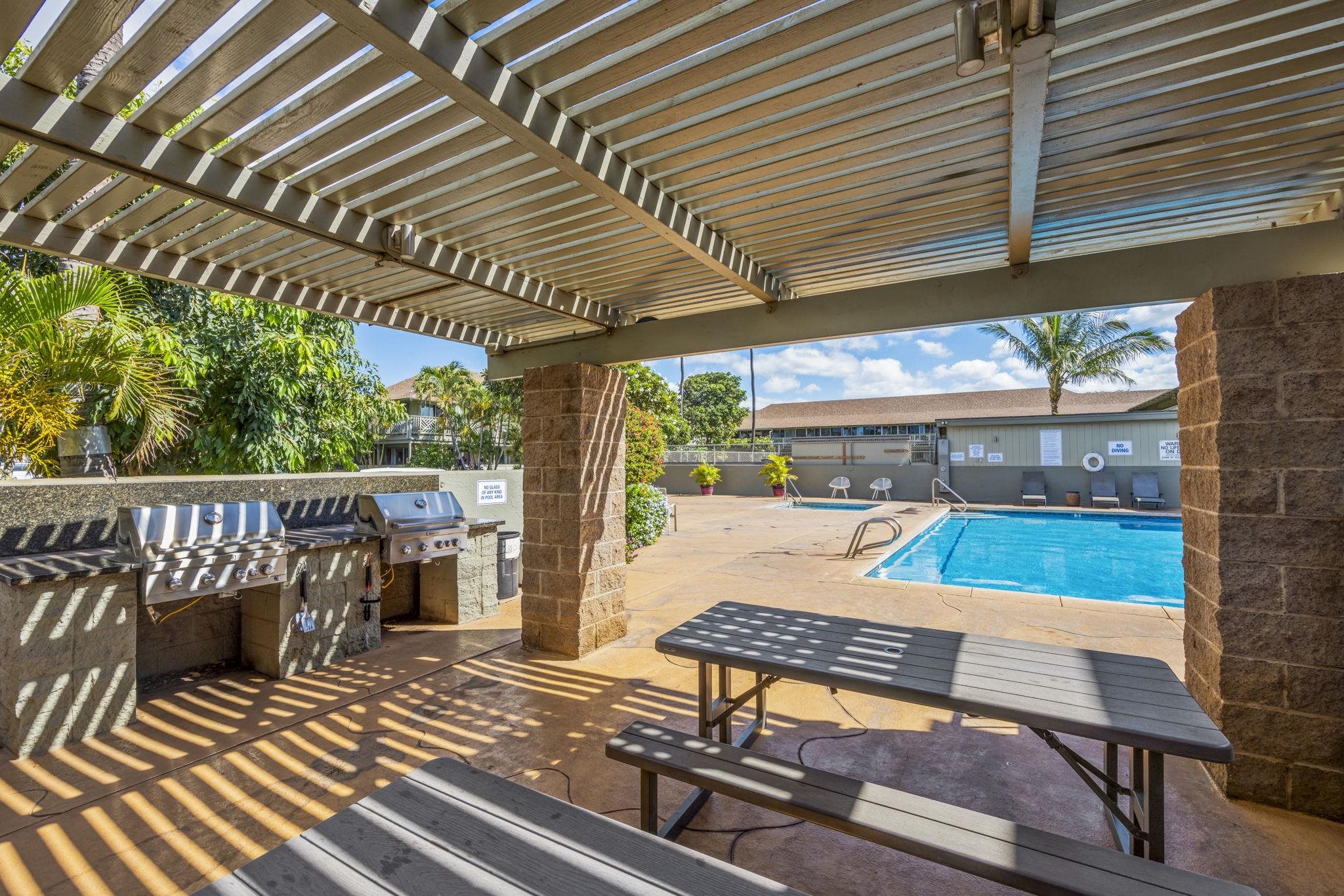 715 South Kihei Road, Unit 106 Kihei, HI 96753 - Photo 23 of 28 a view of a chairs and table in patio
