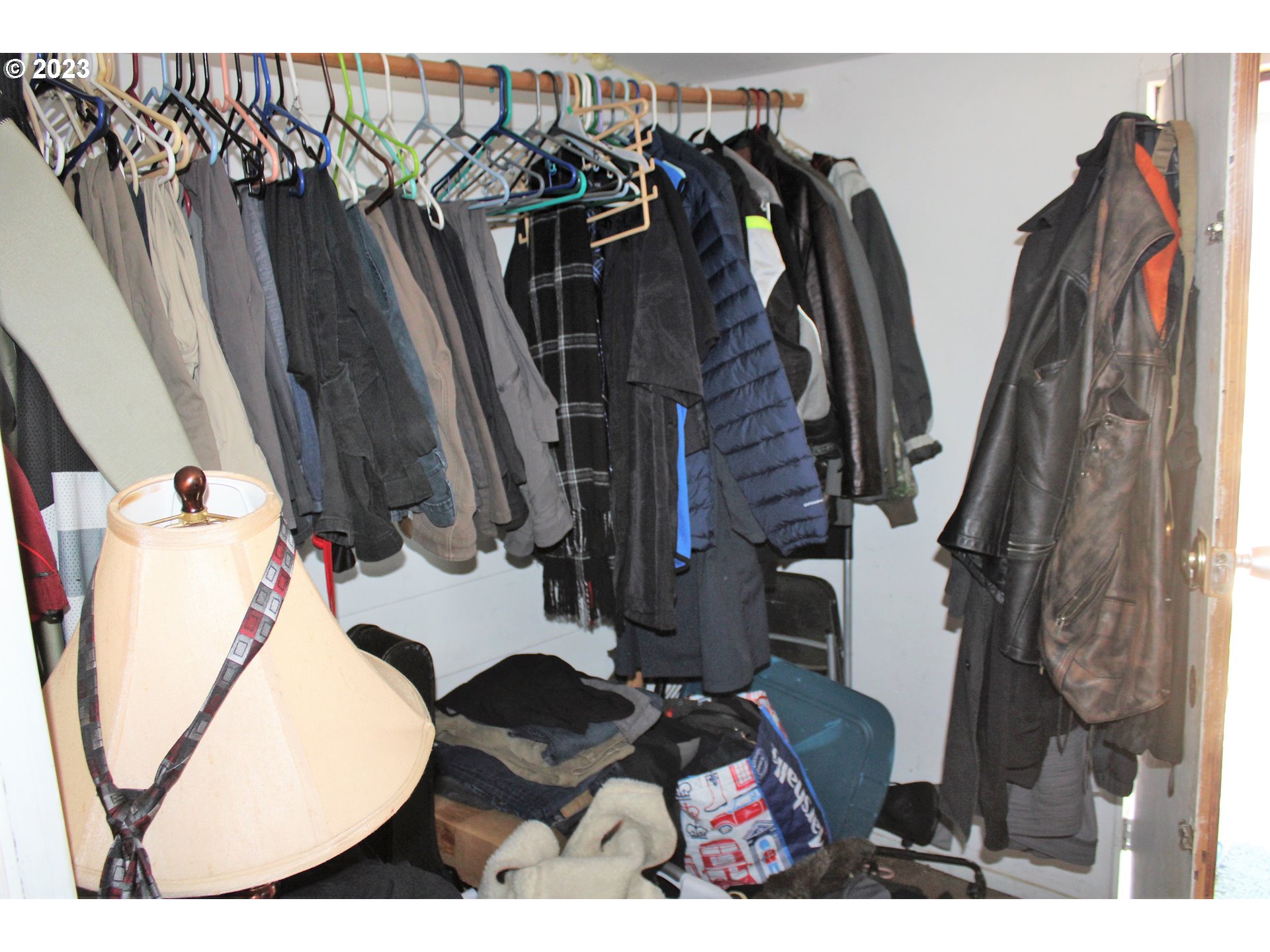 476 Smith Street Riddle, OR 97469 - Photo 15 of 16 a view of walk in closet with clothes and shoes