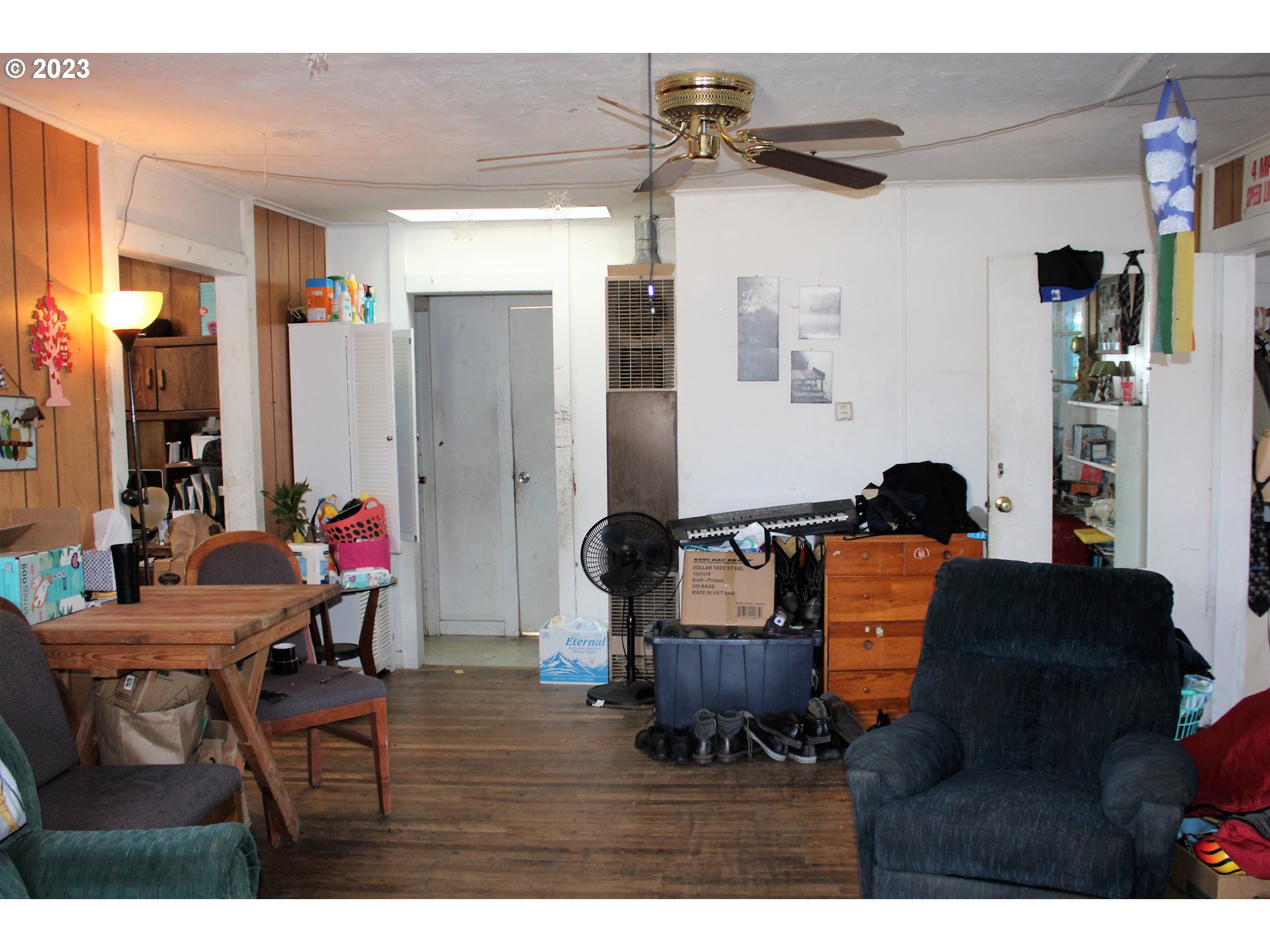 476 Smith Street Riddle, OR 97469 - Photo 5 of 16 a living room with furniture and a wooden floor