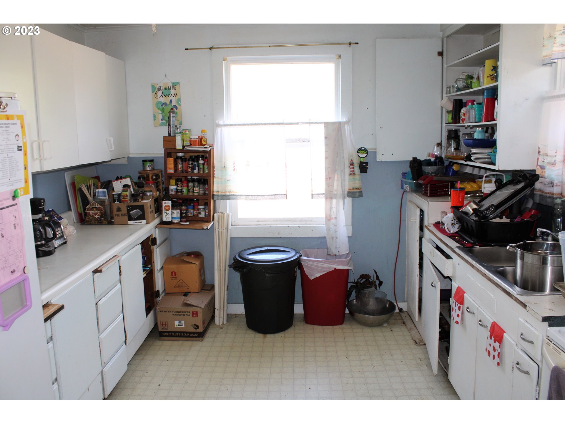 476 Smith Street Riddle, OR 97469 - Photo 8 of 16 a kitchen with a refrigerator and a stove
