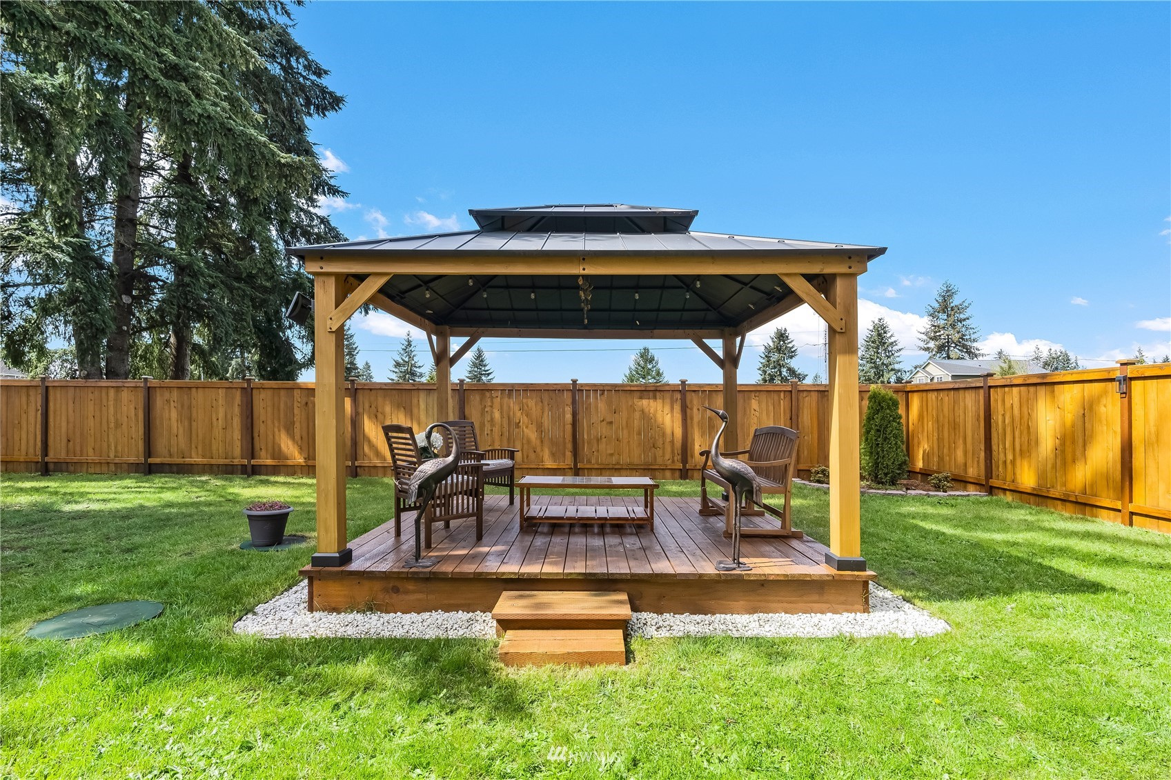 9249 179th Trail Southwest Rochester, WA 98579 - Photo 32 of 40 a view of backyard with sitting area