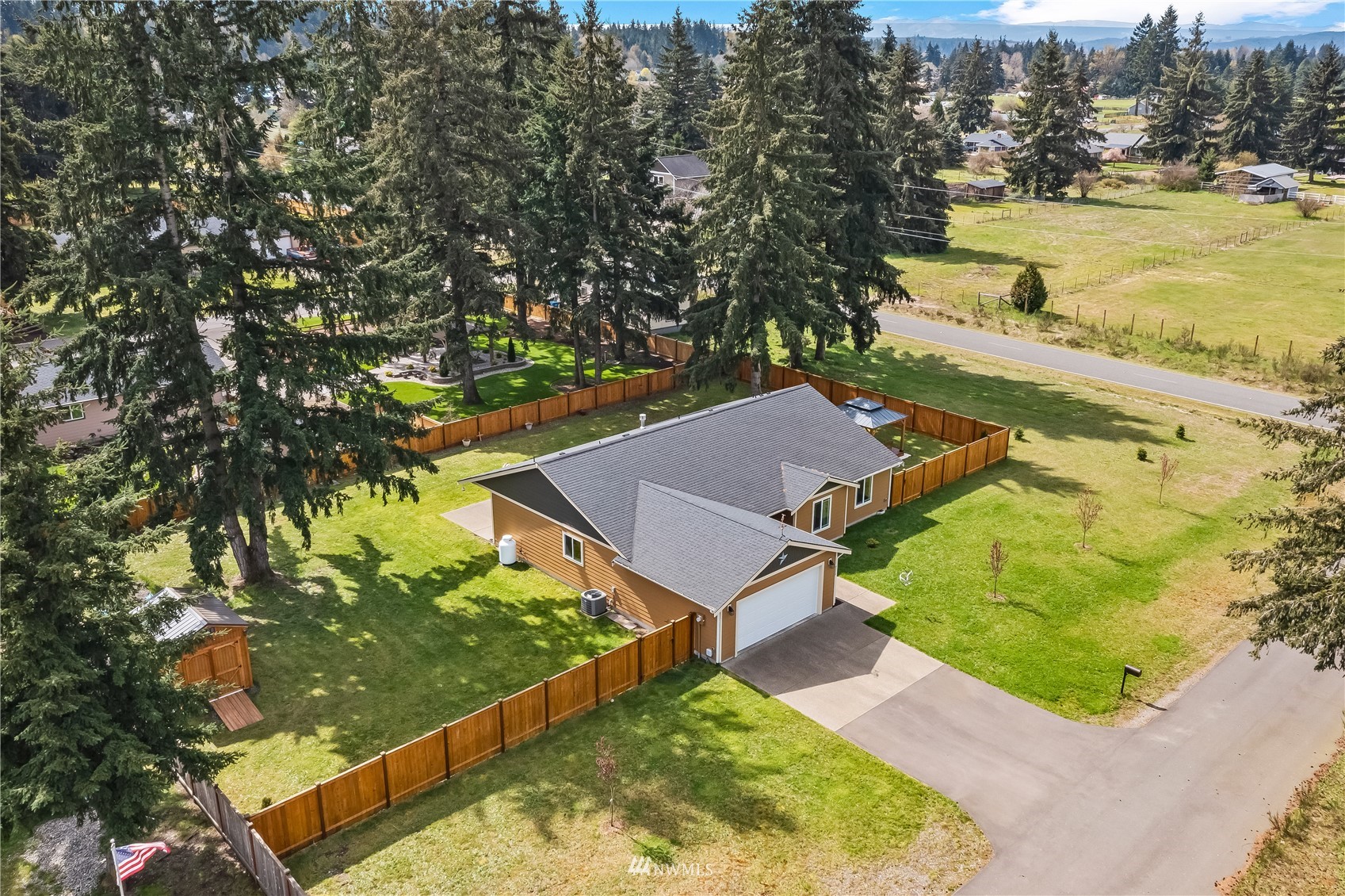 9249 179th Trail Southwest Rochester, WA 98579 - Photo 36 of 40 an aerial view of residential houses with outdoor space