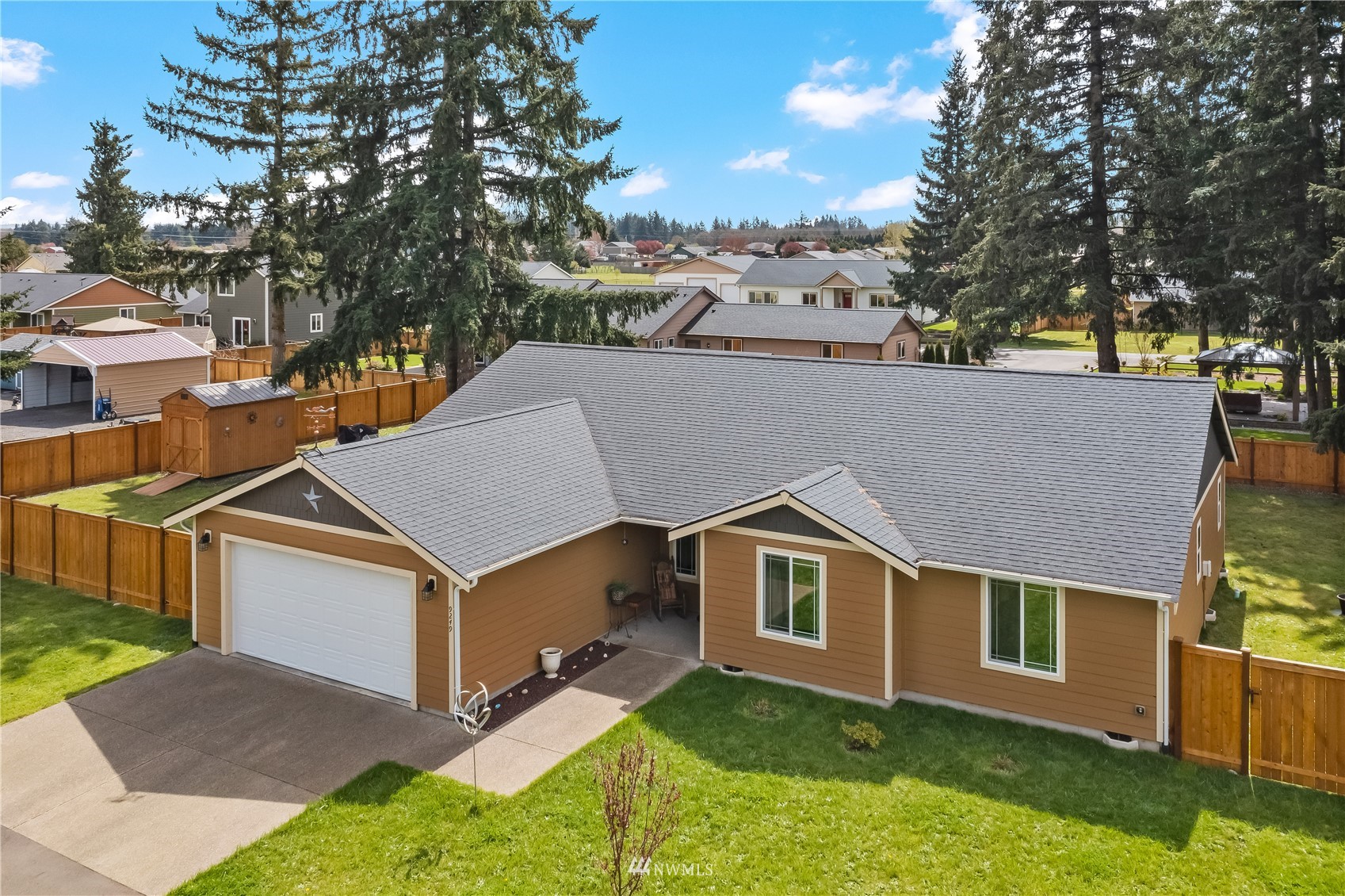 9249 179th Trail Southwest Rochester, WA 98579 - Photo 38 of 40 front view of house with a yard