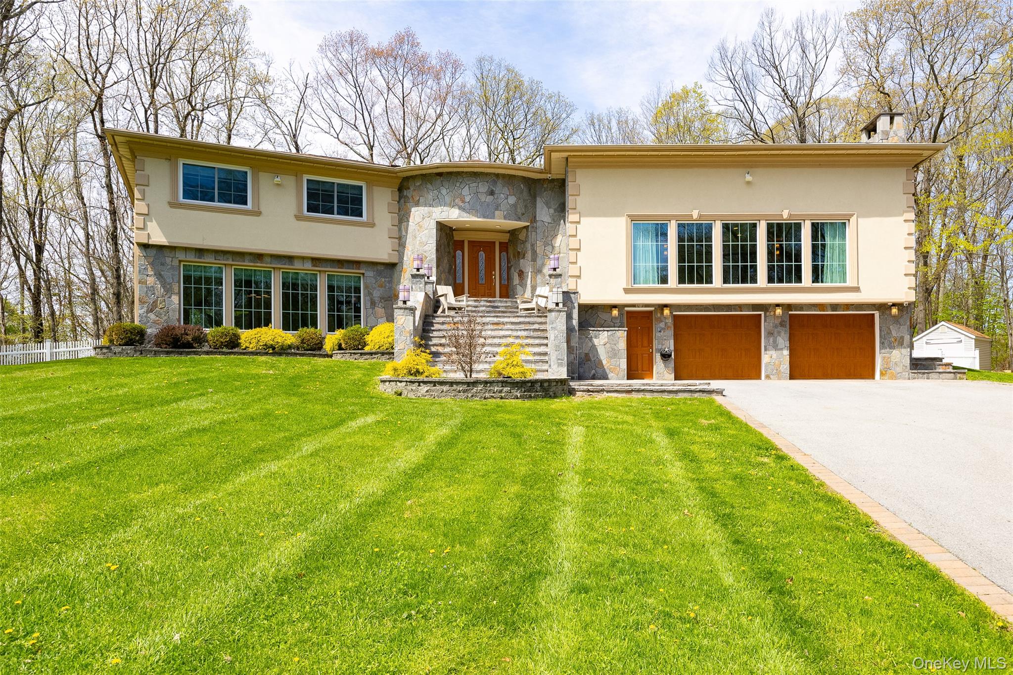 10 Quail Ridge Road Hyde Park, NY 12538 - Photo 1 of 40 a front view of house with yard and green space