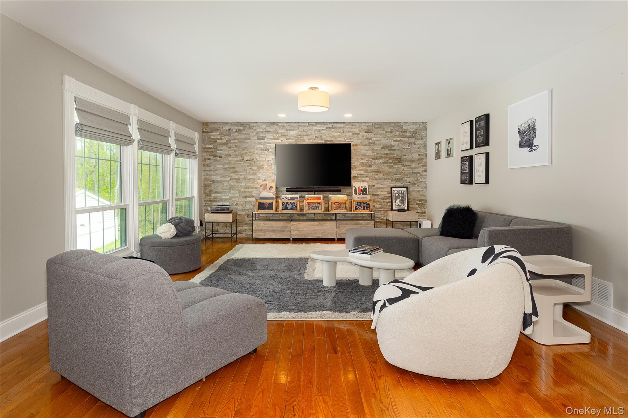 10 Quail Ridge Road Hyde Park, NY 12538 - Photo 13 of 40 a living room with furniture and a flat screen tv