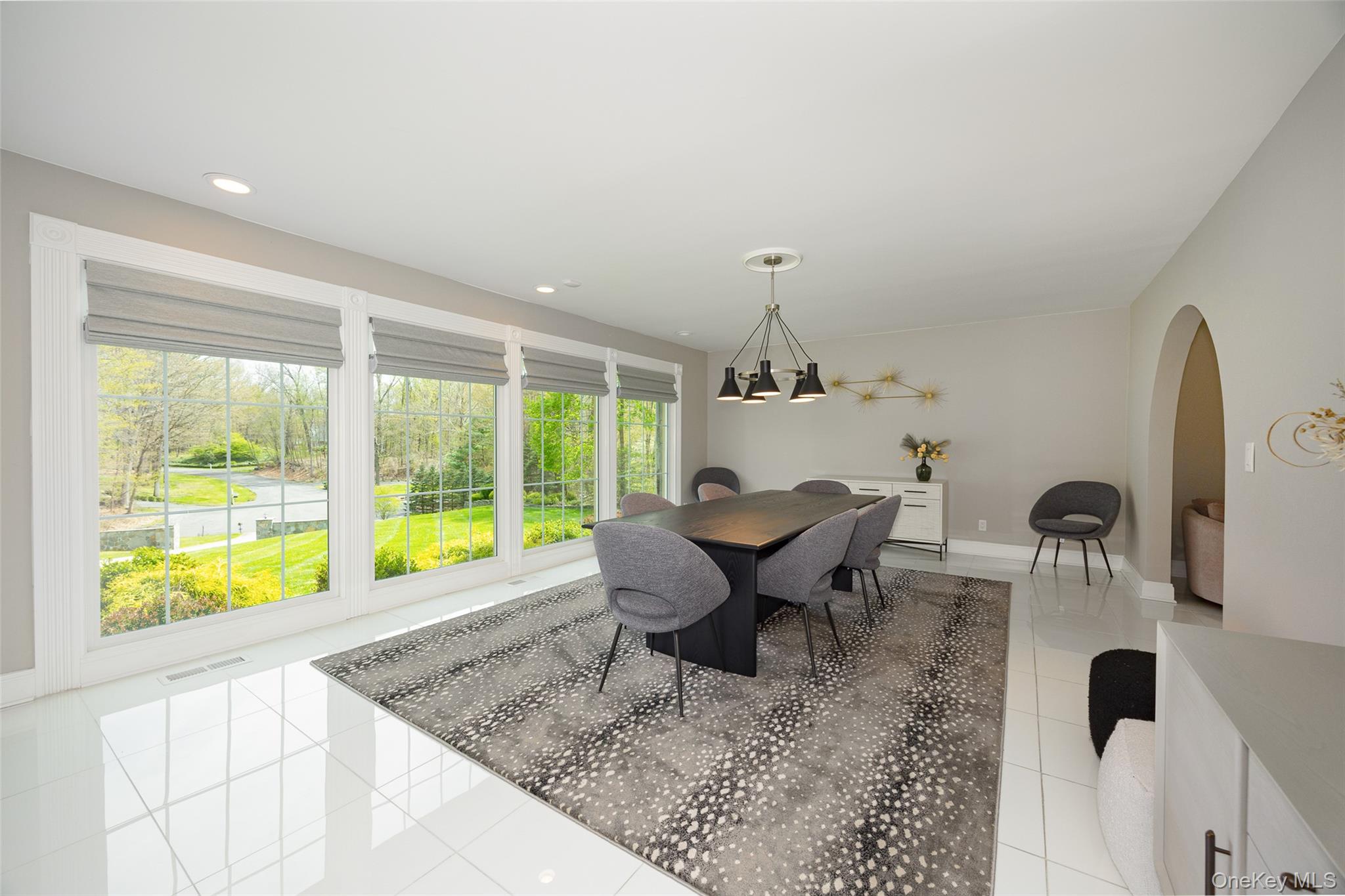 10 Quail Ridge Road Hyde Park, NY 12538 - Photo 17 of 40 a view of a dining room with furniture window and outside view